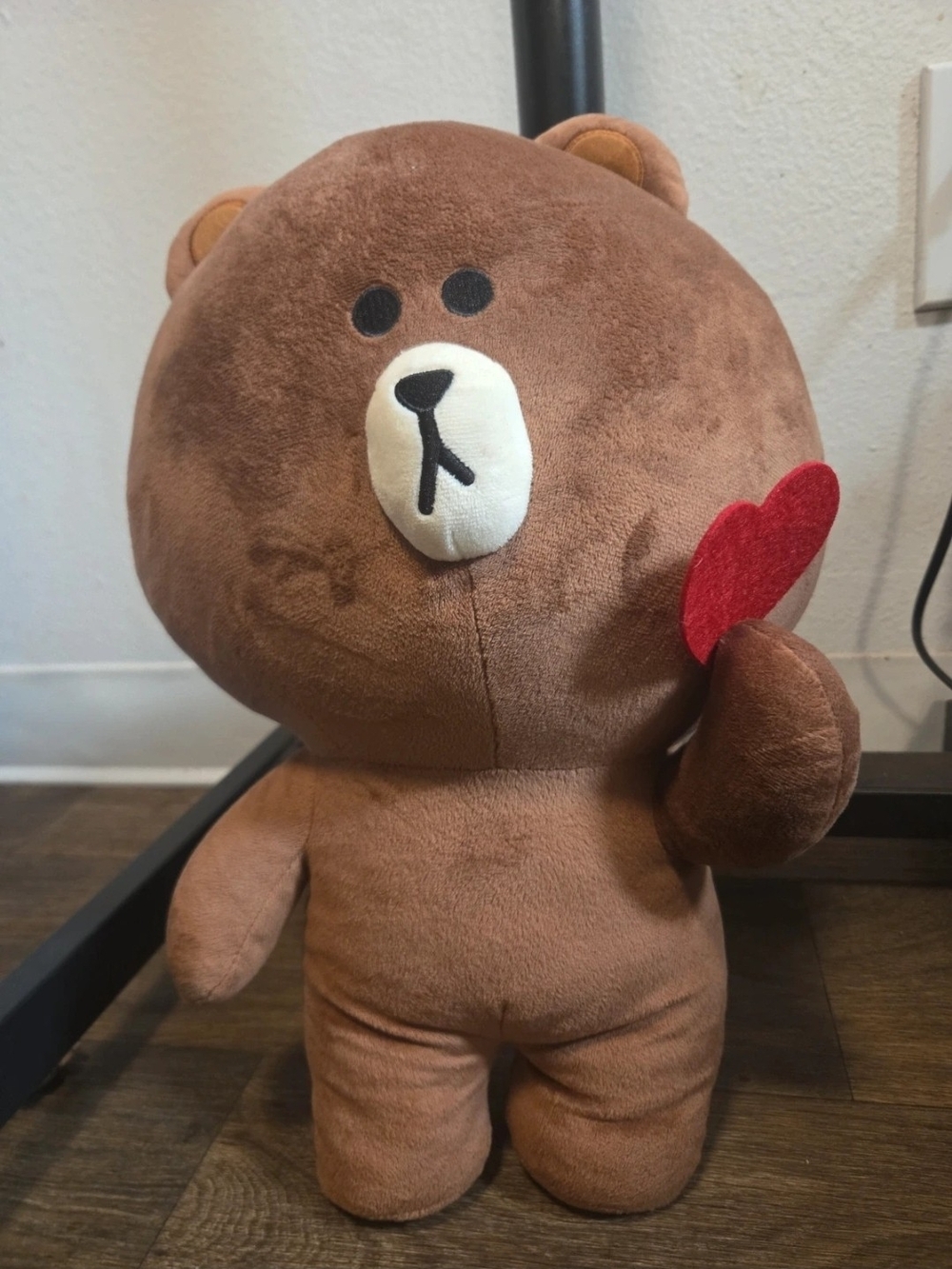 Line friends brown bear holding red heart